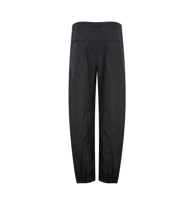 Image 2 of 3 - BLACK - GIVENCHY Cut Out Tracksuit featuring jogger pants with mix materials, elastic waist and ankles, drawstring, tonal Givenchy Paris signature embroidered on the left front pocket, two side pockets, two back pockets, on both sides, Couture seams for a rounded proportion, Coupe dcontracte and lightweight fabric. 65% cotton, 35% polyester.