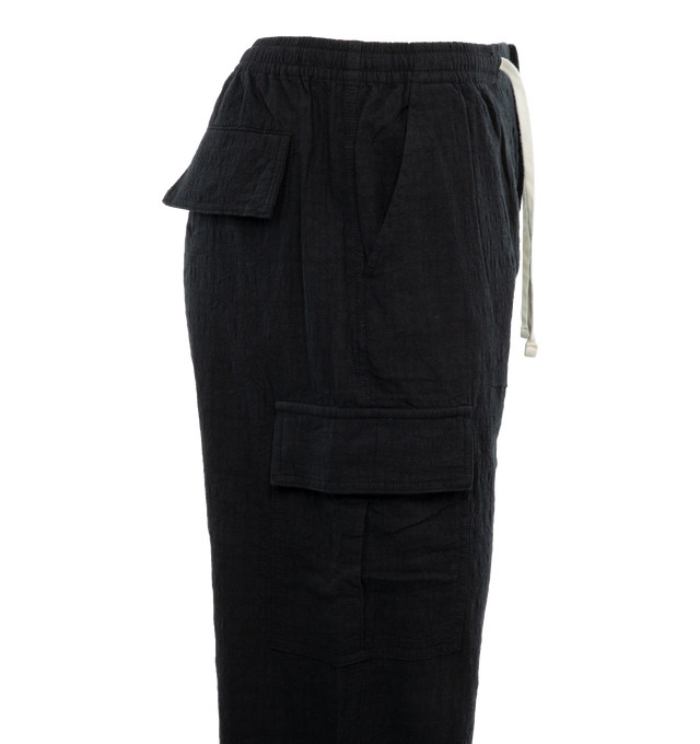 Image 3 of 3 - BLACK - LITE YEAR Cargo Pant featuring side pockets, back flap pocket closure, antique Nickel hardware button closure and drawstring waistband. 100% cotton. 