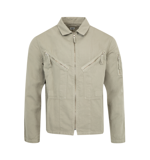 Image 1 of 3 - GREEN - C.P. COMPANY Full Zip Overshirt crafted in garment dyed armatured cotton/linen, lens detail, regular fit, classic collar, full zip fastening, chest zip pockets, sleeve zip pocket, lens detail and adjustable button cuffs. 51% cotton, 49% flax/linen.