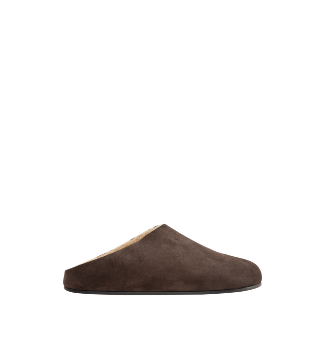 Image 1 of 4 - BROWN - THE ROW Hudson Slide featuring relaxed slip-on shoe in natural suede with round toe, contoured footbed and rubber sole. 100% calfskin leather. Rubber sole. Made in Italy.