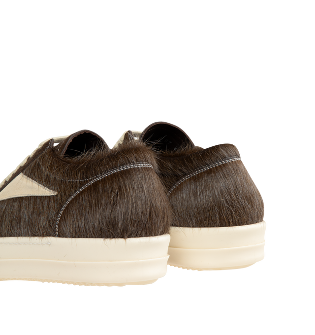 Image 3 of 5 - BROWN - RICK OWENS Vintage Sneaks featuring unshaved cow leather and full grain calf leather, under-ankle height, eight eyelets with laces, toe caps and shark-toothed bumper soles, triangular leather applique on the side foot, a padded ankle and contrast stitching. 100% cow real fur. Lining: 100% calf leather. Made in Italy.