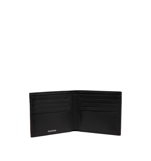 Image 3 of 3 - BLACK - BALENCIAGA Le Cagole Square Folded Wallet featuring Balenciaga logo embossed tone-on-tone at back, aged-silver hardware, front zipped pocket, 8 card slots, 2 bill pockets and 2 receipt compartments. L8.7 x H3.9 x W0.4 inch. 100% lambskin. Made in Italy. 