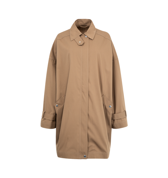 Image 1 of 4 - BROWN - TOTEME Oversized Trench Jacket with subtle trench coat accents featuring relaxed A-line silhouette, slanted pockets, adjustable cuff belts, a zipped front and snap buttons. 100% cotton organic.
