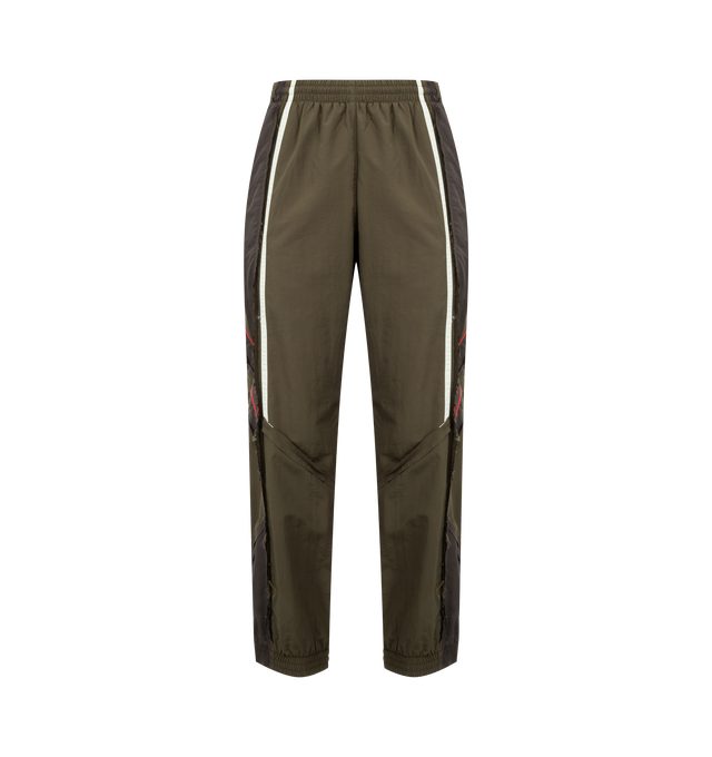Image 1 of 3 - GREEN - MARTINE ROSE Layered Track Pant featuring interior drawstring tie closure, elasticized waistband, side zip pockets, back embroidered logo, zip hem and midweight ripstop fabric. 100% polyamide, Lining: 100% polyester.