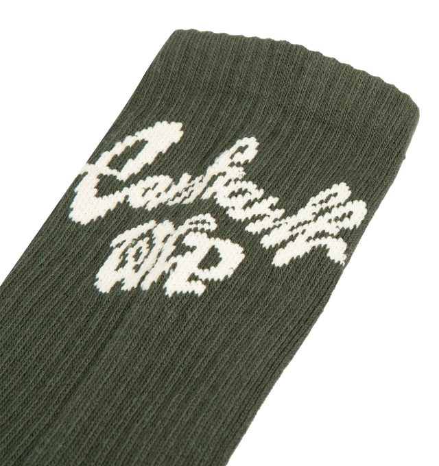 Image 3 of 3 - GREEN - CARHARTT WIP Chedda Socks featuring soft stretch-cotton yarn, rib-knit ankles, french terry panels on the inside of the soles and ajacquard graphic on the back of each sock. 82% cotton, 16% polyester, 2% elastane.