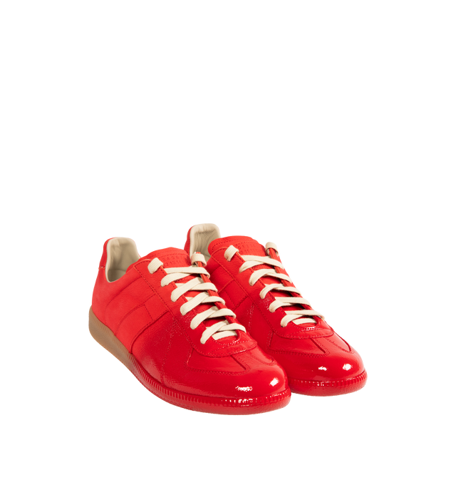 Image 2 of 5 - RED - MAISON MARGIELA Replica Sneakers featuring classic low-top silhouette, contrast of matte leather and a patent sprayed finish, streamlined sole, traditional lace-up construction and signature single white stitch. 100% calf leather. Made in Italy.