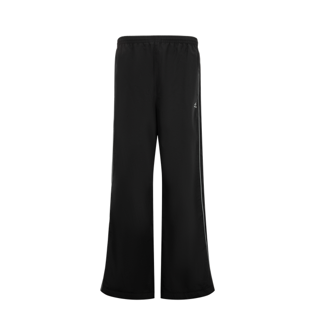 Image 1 of 3 - BLACK - Balenciaga Men's Bodies Tracksuit Pants are crafted from technical cotton poplin and feature a mid-rise silhouette with an elasticated waistband. Reflective piping, two slash pockets, and reflective-effect Bodies artwork printed at the front complete the design. Main Material: 50% Cotton, 50% Polyamide. Lining: 100% Polyester. Made in Italy.