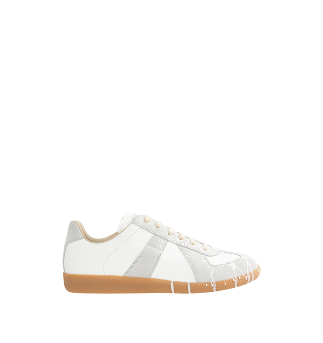 Image 1 of 5 - WHITE - MAISON MARGIELA Replica Sneakers featuring a classic low-top silhouette, contrast of matte leather and a patent sprayed finish, paint splatter detail, lace-up construction and rubber sole. Made in Italy.