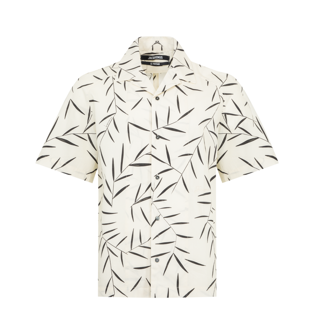 Image 1 of 2 - WHITE - JACQUEMUS Fonccio Shirt featuring relaxed fit, cotton poplin with Foliage print, camp collar, boxy elbow-length raglan sleeves, embroidered 50s logo on the sleeve, back yoke with "J" loop and mother-of-pearl buttons. 100% cotton. Made in France.