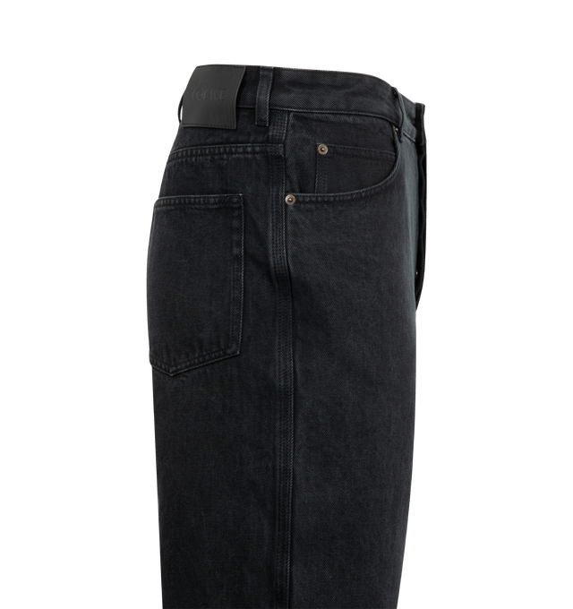 Image 3 of 3 - BLACK - LOEWE Anagram Baggy Jeans in denim featuring medium-weight washed cotton denim, an Anagram embroidery at the knees, relaxed fit, regular length, mid waist, loose leg, five pocket style, concealed button fly and LOEWE embossed leather patch placed at the back. 100% cotton. Made in Italy.