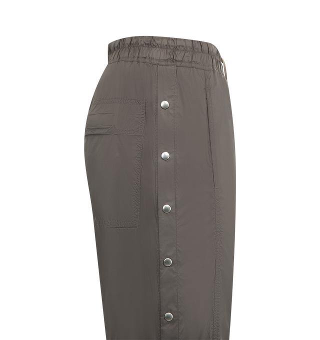 Image 3 of 3 - GREY - DRKSHDW Pusher Pants featuring elastic waistband with drawstring, back flap pockets and side buttons detail down the leg. 100% nylon. Made in Italy.