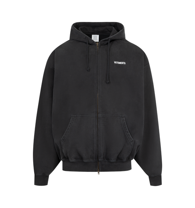 Image 1 of 2 - BLACK - VETEMENTS Iconic Logo Zip-Up Hoodie featuring french terry hoodie, drawstring at hood, logo embroidered at hood and chest, zip closure, patch pockets at front, rib-knit hem and cuffs and dropped shoulders. 100% cotton. Made in Portugal.