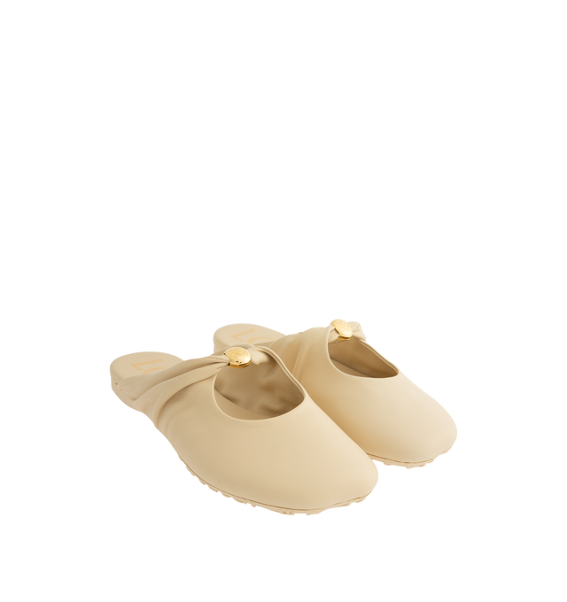 Image 2 of 4 - NEUTRAL - LOEWE Pebble Soft Mule in supple nappa lambskin with a flexible upper featuring a metallic Pebble with an Anagram engraved detail and a signature petal toe shape, padded leather insole and anagram embossed rubber outsole. Lambskin. Made in Italy.