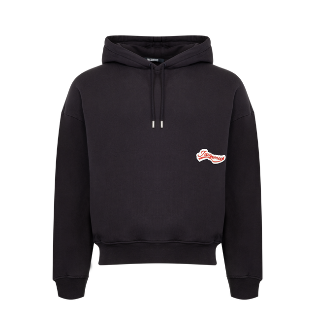 Image 1 of 4 - BLACK - JACQUEMUS Gio Hoodie featuring cotton hoodie with logo drawstring, logo embroidery on the front and back, side pockets and long cuffed sleeves. 100% cotton. Made in Portugal.