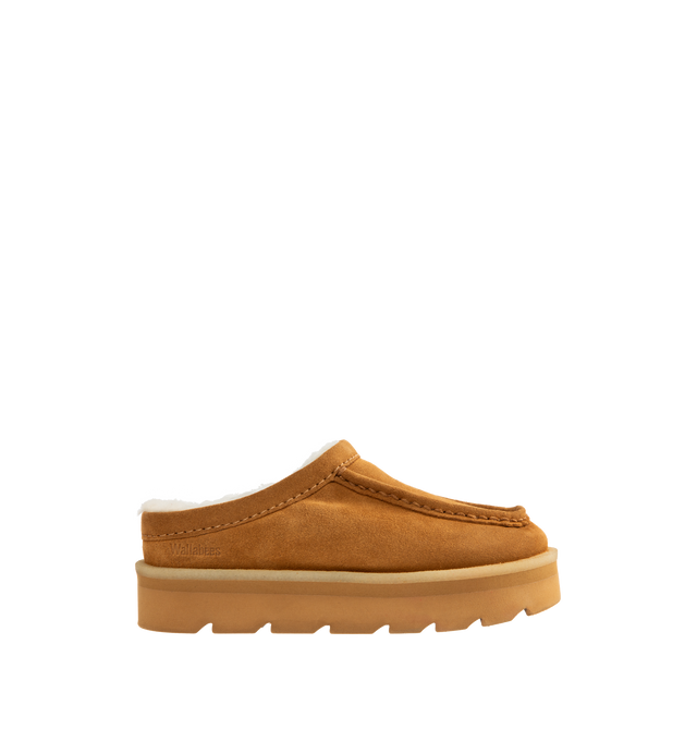 Image 1 of 4 - BROWN - CLARKS Meare Mule featuring suede uppers, synthetic fur lining, hand stitched apron seam, crepe rand, tonal EVA rubber sole, Woven Clarks Originals label on sock and Wallabees branding on heel.