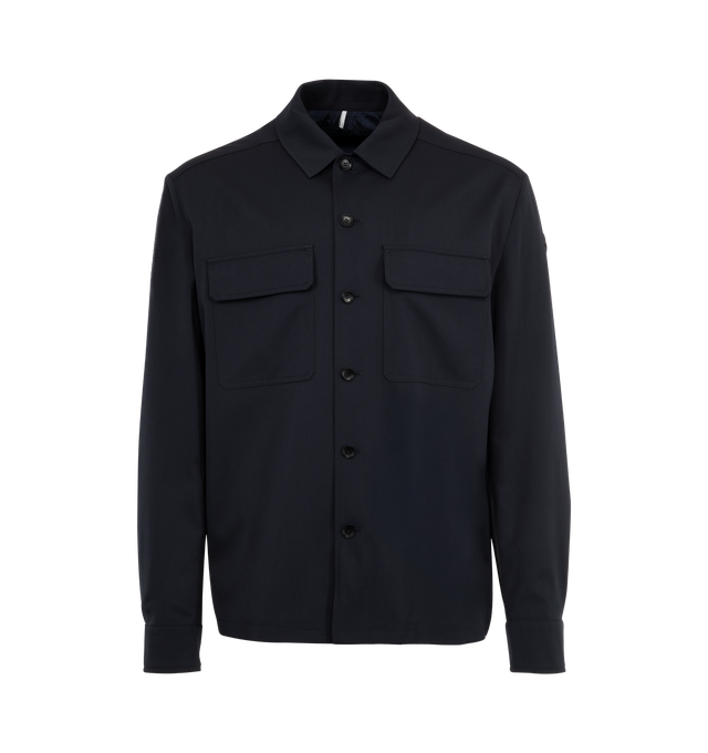 Image 1 of 4 - NAVY - MONCLER Wool Gabardine Long Sleeve Shirt featuring wool blend gabardine, AirSoft lining, zip and button closure and leather logo patch. 54% virgin wool, 45% polyester, 1% elastane/spandex. Lining: 100% polyester. Made in Romania.