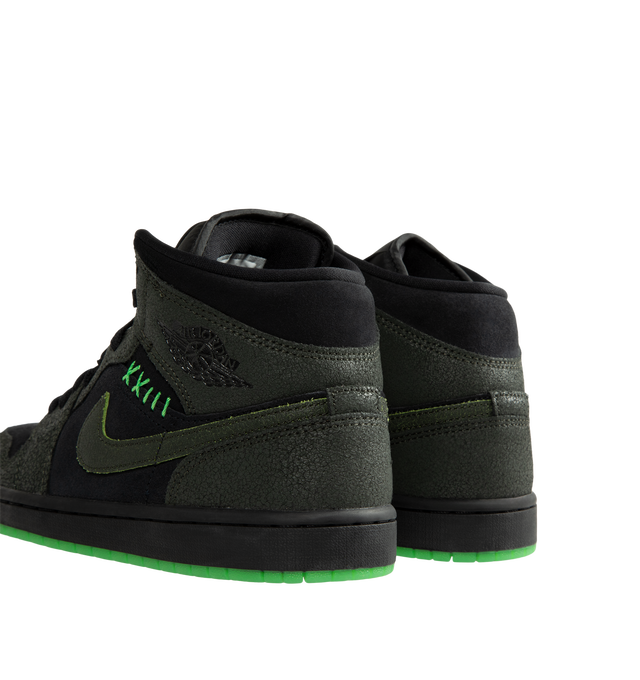 Image 3 of 5 - BLACK - Air Jordan 1 Mid SE Men's Shoes are crafted from premium leather and feature the iconic mid-top silhouette inspired by the original Air Jordan 1. Designed with Nike Air cushioning and a durable rubber outsole, this special edition style delivers everyday comfort while maintaining the classic look that made the AJ1 a legend. Signature details include the Wings logo at the collar, a stitched Swoosh logo, and Jumpman branding at the tongue. Main Material: Leather Upper. Cushioning: Nike