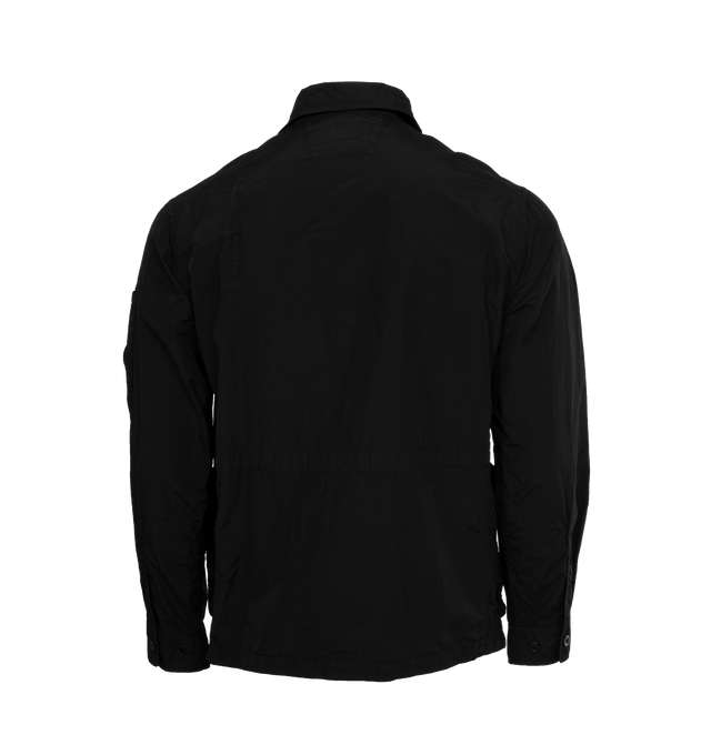 Image 2 of 3 - BLACK - C.P. COMPANY Flatt Nylon Utility Overshirt featuring classic collar, front button closure, four flap pockets and adjustable cuffs and hem. 100% polyamide/nylon. 
