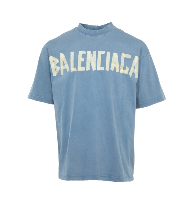 Image 1 of 4 - BLUE - BALENCIAGA Tape Type T-Shirt Medium Fit featuring vintage jersey, crewneck, short sleeves, tape Type logo at front and back and worn-out and washed-out effect. 100% cotton. Made in Portugal. 
