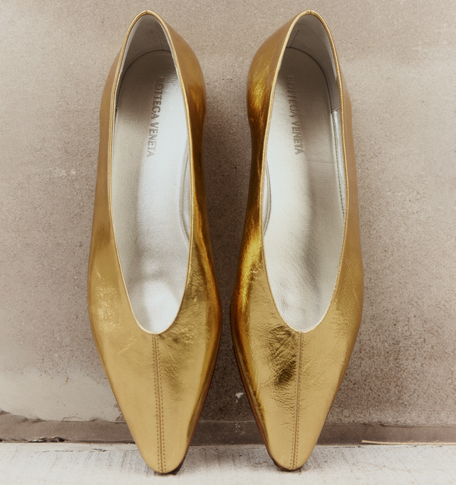 Image 2 of 6 - GOLD - BOTTEGA VENETA Sofia Ballerina featuring ballerina flat with supple construction in reflective goatskin and rubber injected leather outsole. Goatskin. Made in Italy.