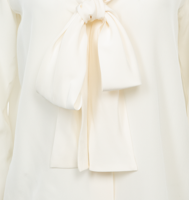 Image 3 of 3 - WHITE - NILI LOTAN ANGELIQUE TIE NECK BLOUSE featuring relaxed deep v, neck-tie blouse and exposed centerfront buttons. 100% silk. Made in USA.