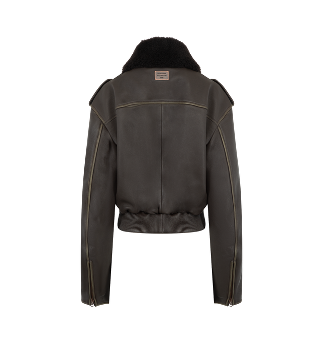 Image 2 of 3 - BROWN - ACNE STUDIOS Leather Bomber Jacket featuring soft lamb leather with a shearling collar, dropped shoulders with epaulettes, front flap pockets, side welt pockets, an elasticated hem, front snap button, zipper closure, zip sleeves, a metal logo plaque at the back neckline, relaxed fit and below-waist length. 100% Lamb leather. 100% Lamb shearling. Lining: 100% viscose.