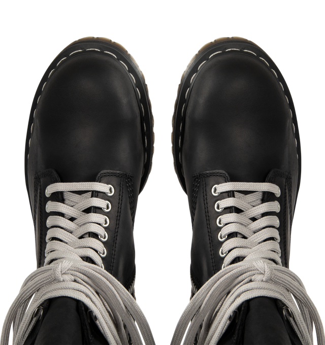 Image 4 of 4 - BLACK - RICK OWENS X DR. MARTENS Steel Toe Quad Platform Boot featuring waxy Republic leather with a padded collar detail, hardened with a steel toe cap, classic eyelets and speed hooks with the exaggerated wraparound laces, easy-access inner ankle zip, extra height Quad sole with pure white welt stitch and a special edition heel loop.