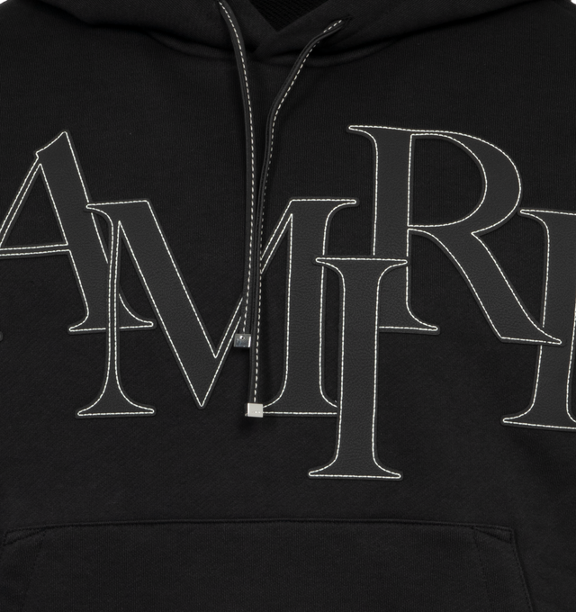 Image 3 of 3 - BLACK - AMIRI Staggered Logo Hoodie featuring slouchy hood, drop shoulder, front pouch pocket, straight hem and embroidered logo at the chest and back. 100% cotton.  