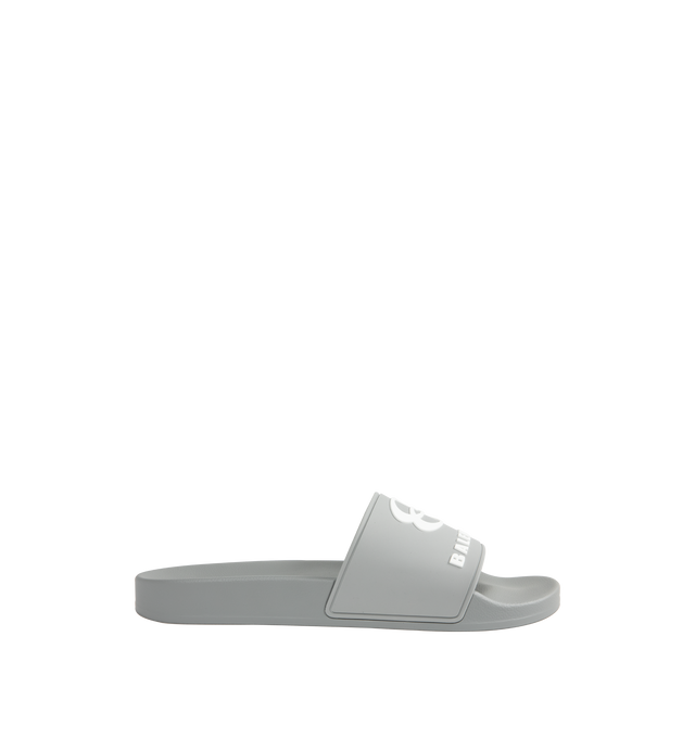 Image 1 of 4 - GREY - BALENCIAGA Pool Slide Sandal featuring molded rubber footbeds, unity sports icon artwork on the strap and tone-on-tone sole and insole. Upper: polyurethane. Sole: EVA. Made in Italy.