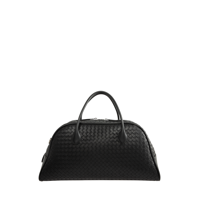 Image 1 of 3 - BLACK - Bottega Veneta Men's Bauletto Bag is crafted from Intrecciato leather and features an adjustable and detachable crossbody strap, a zip-top closure, and a suede-lined interior. Designed for everyday organization, it includes one interior zip pocket and two flat open pockets, and is finished with silver-tone hardware. Main Material: Calfskin Leather. Lining: Suede. Hardware: Silver Finish. Made in Italy. *This item may be restricted for online purchase to international clients. For assi