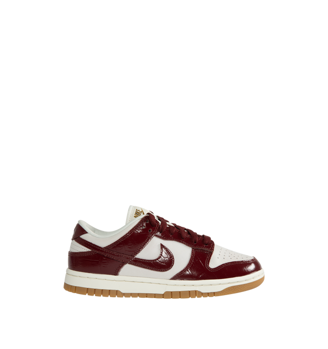 Image 1 of 5 - PURPLE - NIKE Dunk Low LX Sneaker featuring lace-up front, signature Swooshes at sides, embossed Air logo at foxing, perforated toe and padded collar with debossed Nike logo at back counter.