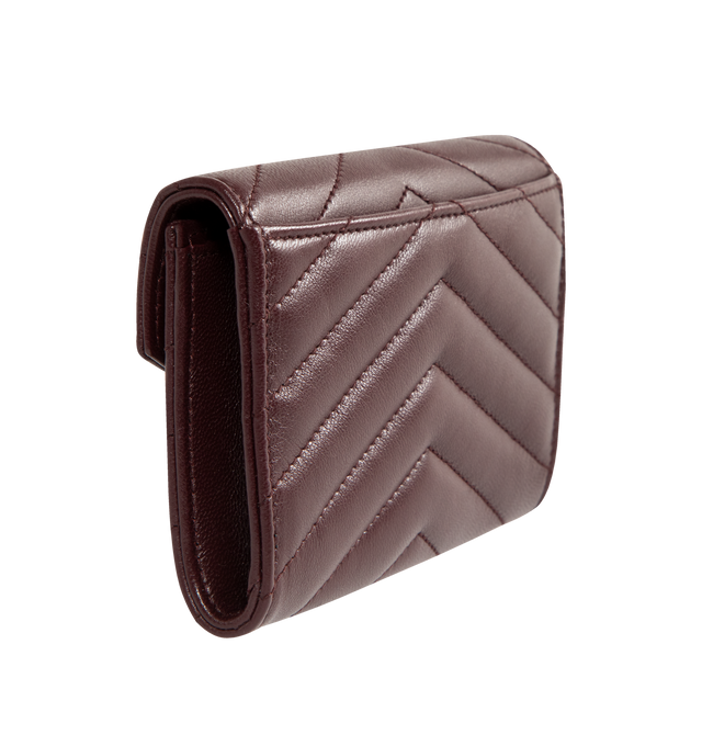 Image 2 of 3 - RED - SAINT LAURENT Small Envelope Wallet featuring quilted overstitching, leather lining, snap button closure, one flat pocket at back, four card slots and one open compartment. 5.3" X 3.7" X 1.2". 100% lambskin.