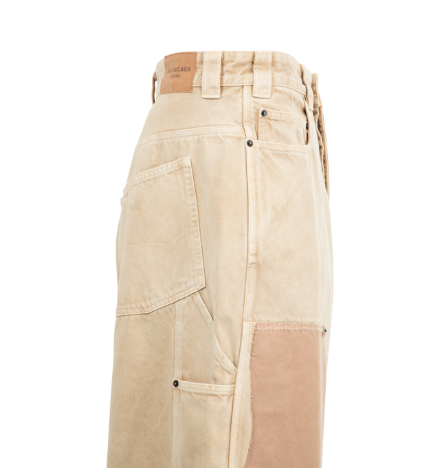 Image 3 of 3 - BROWN - BALENCIAGA Ripped Off Baggy Pants featuring cotton denim, covered zip fly, 5 belt loops, 5 pockets, yokes with rivets at front, ripped at back, Balenciaga engraved flex buttons and jacron at back. 100% cotton. Made in Italy.