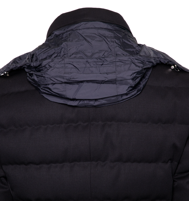 Image 3 of 5 - NAVY - MONCLER Bess Short Down Jacket featuring nylon lger lining, down-filled, pull-out, adjustable rainwear hood with elastic drawstring fastening and snap buttons, contrasting-colored interior piping, ribbed knit collar, inner front bottom with tricolored detailing, zipper and snap button closure, zipped external and internal pockets and leather logo. 100% virgin wool. Lining: 100% polyamide/nylon. Padding: 90% down, 10% feather. 