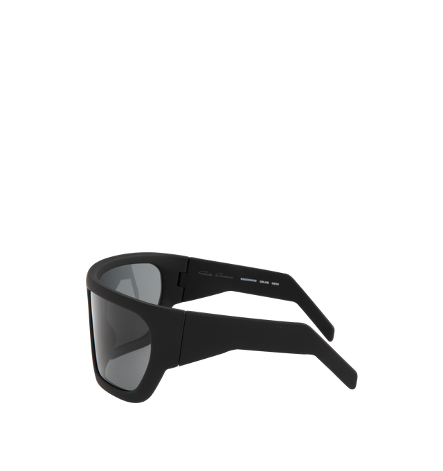 Image 2 of 3 - BLACK - RICK OWENS Davis Sunglasses featuring large wrap around frames with geometric curved lenses, thing angles arms and logo on the inside right. Frame: 100% grilamid. Lenses: 100% nylon. 100% UVA/UVB protection.