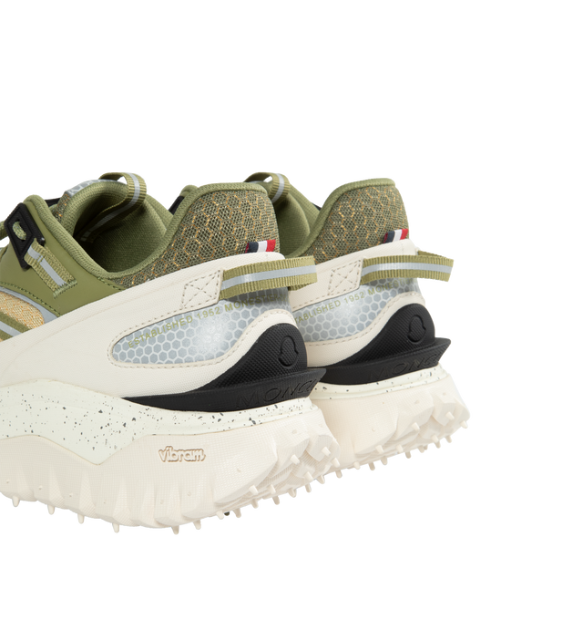 Image 3 of 5 - GREEN - MONCLER Trailgrip Sneakers featuring mesh upper, mesh lining, lace closure, TPU spoiler sole, EVA midsole, carbon fiber between midsole and tread, Special Vibram MEGAGRIP rubber compound tread and OrthoLite insole. Sole height 4.5 cm. 100% polyester. Lining: 100% polyamide/nylon. Sole: 100% elastodiene.