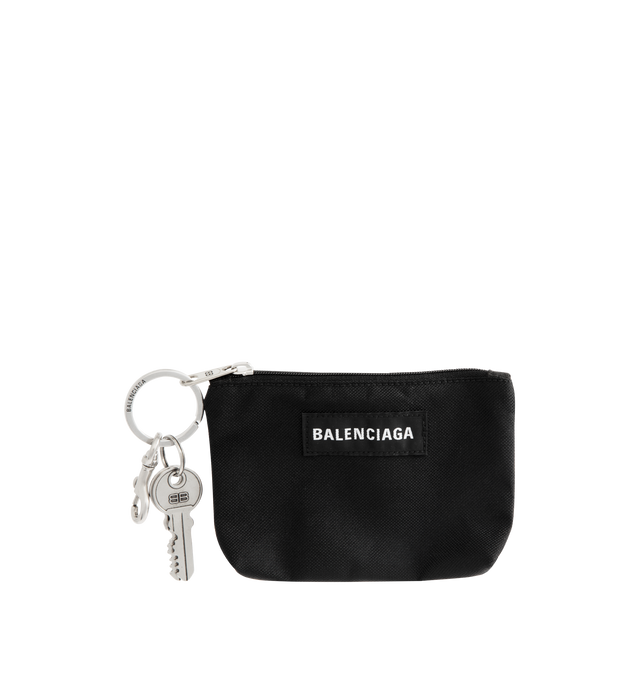 Image 1 of 3 - BLACK - BALENCIAGA Charm Zipped Pouch in recycled nylon featuring Balenciaga logo patch at front, aged-silver hardware, 1 main zipped compartment and can be attached to the bag or be used as a keychain. L5.1 x H4.3 x W0.4 inch. Polyamide, polyester, polyurethane, cotton, viscose, zamak. Made in Italy.