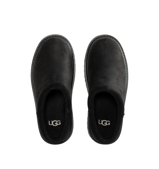 Image 4 of 4 - BLACK - UGG Men's Birch Clog II is crafted from premium suede and features a slip-on clog silhouette with a soft lining and cushioned footbed for exceptional everyday comfort. These designer clogs combine UGG's signature cozy feel with durable construction, making them a versatile choice for both indoor and outdoor wear. Main Material: Suede. Lining: Soft Textile. Sole: Rubber.