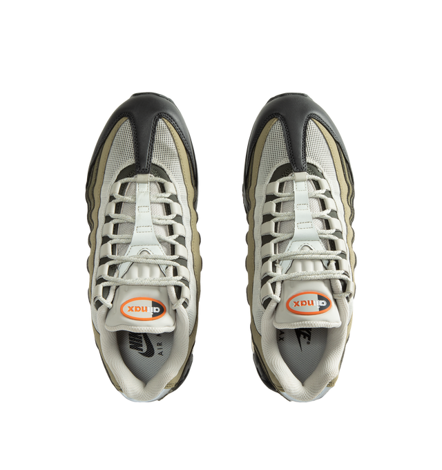 Image 5 of 5 - GREEN - Nike Men's Air Max 95 Big Bubble Casual Shoes revive the iconic 1995 silhouette with a construction restored to original specifications. Inspired by human anatomy, the layered upper combines mesh and leather panels for a balance of breathability, comfort, and structure, while reflective details enhance visibility and signature style. An enlarged heel Air unit pairs with visible forefoot Air cushioning for plush comfort and authentic OG appeal. Flex grooves in the sole promote a natura