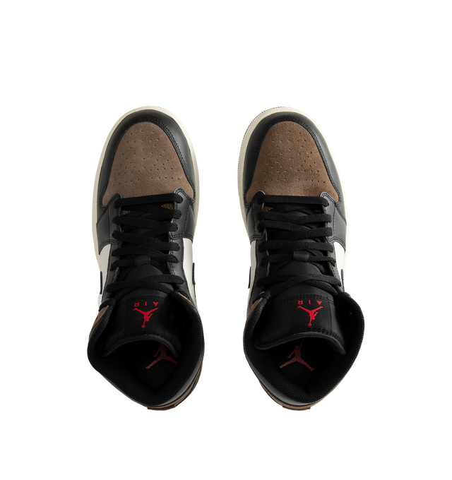 Image 5 of 5 - MULTI - Men's Air Jordan 1 Mid Sneakers feature a smooth leather upper with the iconic mid-top silhouette, breathable perforated toe box, and a padded collar for a timeless heritage look. These lifestyle sneakers combine a foam midsole with encapsulated Air-Sole cushioning and a durable rubber outsole with concentric traction for lightweight comfort, lasting support, and reliable everyday grip. Main Material: Leather. Midsole: Foam with Encapsulated Air-Sole Unit. Sole: Rubber.