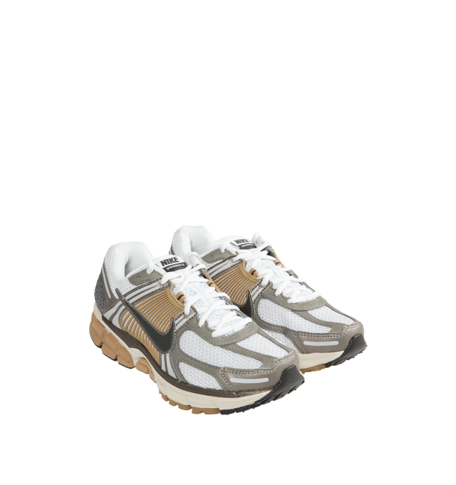 Image 2 of 5 - GREY - NIKE Zoom Vomero 5 Sneaker featuring synthetic leather on the upper, mesh panels and ventilation ports on the heel, Zoom Air cushioning, plastic caging on the side, reflective details and rubber outsole.