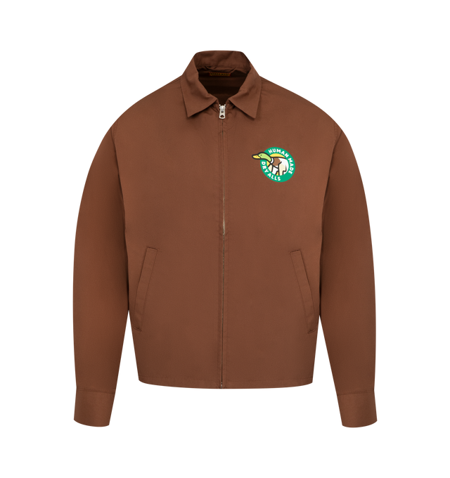 Image 1 of 2 - BROWN - HUMAN MADE Drizzler Jacket featuring a regular fit, short length, lightweight, firm polyester-cotton blend, duck graphics connecting the front and back, rubber prints enhance the design and heart buttons on the cuffs. 65% polyester, 35% cotton.