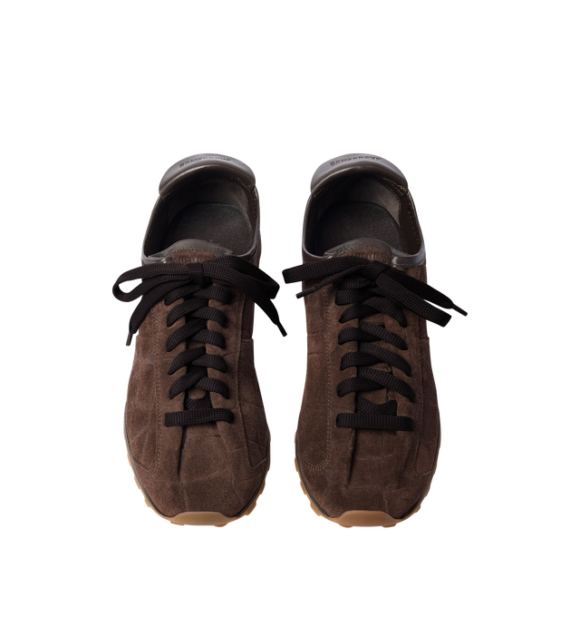 Image 4 of 4 - BROWN - JACQUEMUS Tennis Sneaker featuring soft crocodile-embossed suede, almond-shaped toe, flat laces, embossed logo on the tongue, embossed logo on the heel tab, removable leather-covered insole and rubber outsole in a round and square shape. 100% calf leather. Outsole: 100% thermoplastic polyurethane. Made in Portugal.