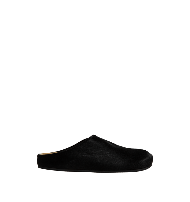 Image 1 of 4 - BLACK - The Row Slip-on clog with a sightly cushioned suede footbed, rounded toe and branded insole.  Upper: 100% Calfskin Leather; Sole: 100% Rubber. 