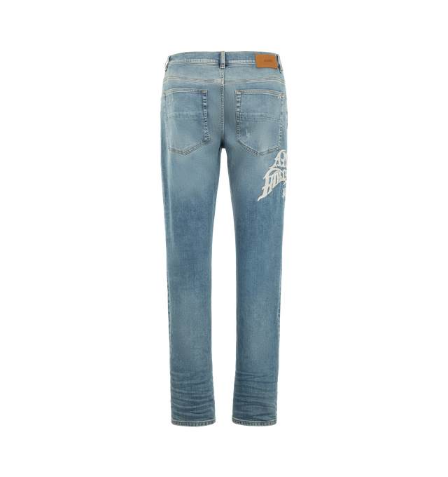 Image 2 of 3 - BLUE - Amiri Mens Hollywood MX1 Jeans are crafted from stretch denim with a hand-distressed finish. Feature a slim fit, five-pocket styling, pleated denim repair panels, satin embroidered detailing, button and zip closure, and signature MX1 construction. Main Material: 92% Cotton, 6% Elastomultiester, 2% Elastane. Made in Italy.