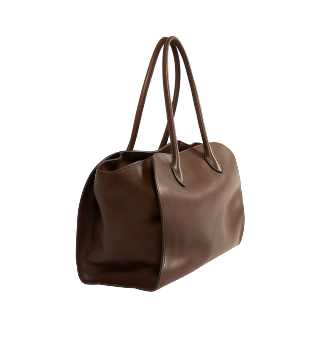 Image 2 of 3 - BROWN - The Row Marlo 14 softly structured tote bag in polished saddle leather with tubular handles, gusseted side panels, and top zipper closure. 100% calfskin leather; 100% cotton lining. Made in Italy. Measures 14 x 6.2 x 10.5".
