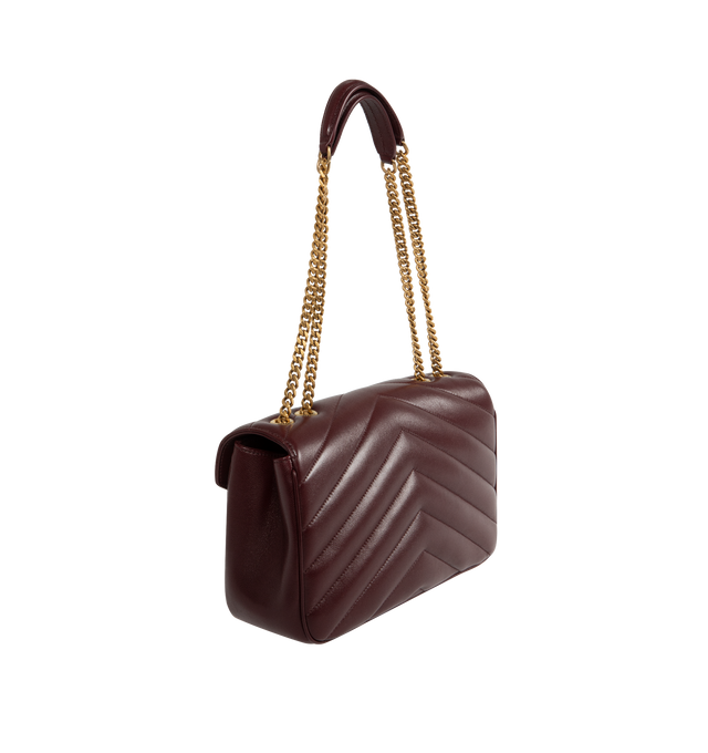 Image 2 of 4 - RED - SAINT LAURENT Loulou Medium Bag featuring chain bag in soft lambskin with chevron-quilted topstitching, removable leather pouch and pocket mirror, sliding chain strap, grosgrain lining, bronze-toned hardware, magnetic snap closure and one flat pocket. 11.4" x 6.7" x 3.1". Single strap drop: 17.7". Doubled strap drop: 8.7". Lambskin, brass. Made in Italy.