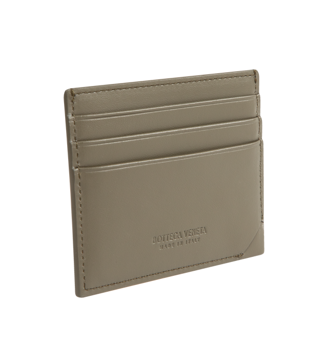 Image 2 of 3 - GREEN - BOTTEGA VENETA Intrecciato Stamp Credit Card Case featuring credit card case in calf leather with embossed Intrecciato pattern, three card slots and one central pocket. 3.1" x 4.1" x 0.2". Calfskin. Made in Italy.