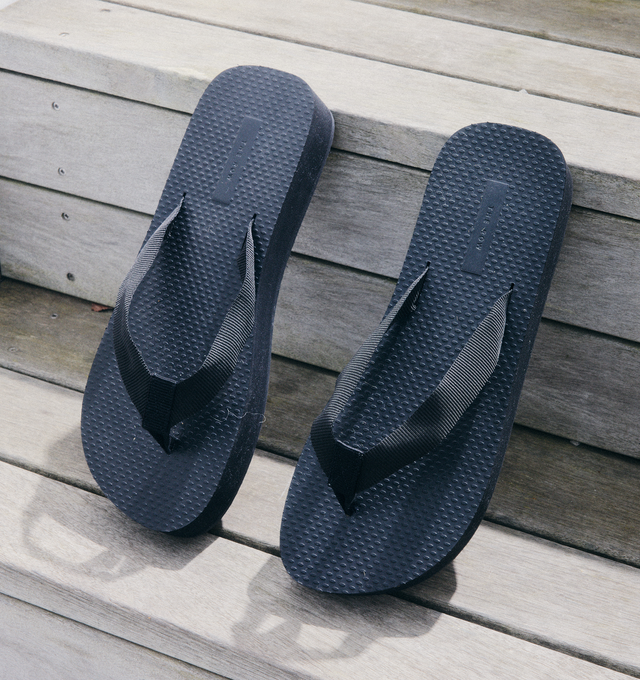 Image 2 of 5 - BLACK - The Row Platform flip-flop sandal in cotton grosgrain with textured footbed and lightweight rubber sole. 66% Cotton, 34% Viscose, synthetic sole. Made in Italy.