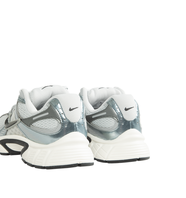 Image 3 of 5 - GREY - Nike Men's V5 RNR Sneakers feature a layered suede and mesh upper for a breathable, Y2K-inspired look with retro running style. These lifestyle sneakers combine a lightweight foam midsole, plush collar lining, and a durable rubber outsole with 2000s-inspired grooves for all-day comfort and reliable traction. Main Material: Suede and Mesh. Midsole: Foam. Sole: Rubber.